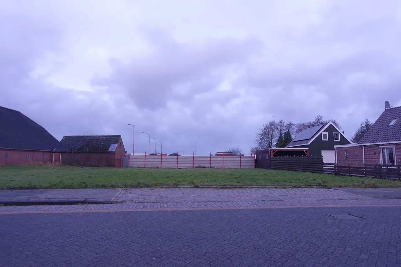 Original real estate photo with a grey sky